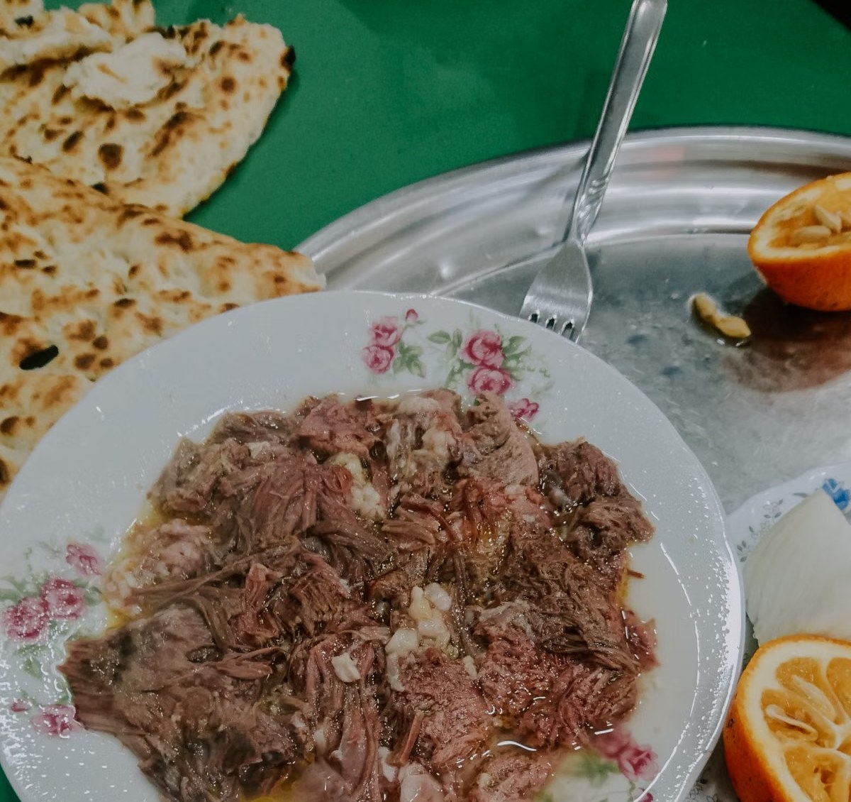 Cumin beef served with warm flatbread for a northwestern-style meal.