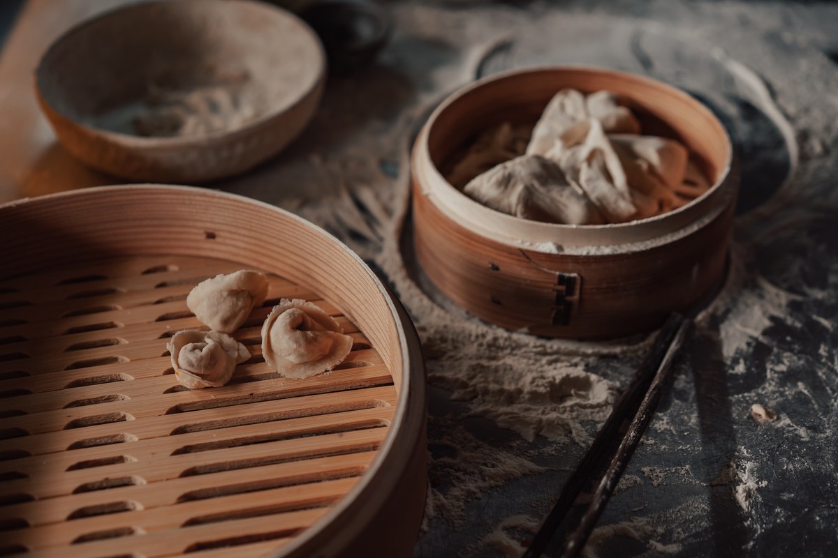 Chinese dumplings in bamboo steamers for a beginner dumpling batch.