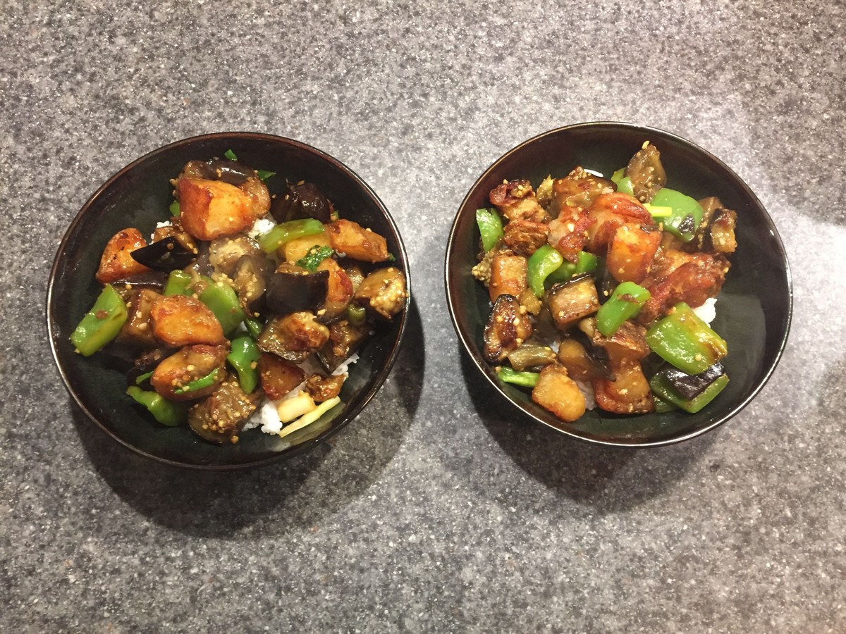 Di San Xian with eggplant, potato, and green pepper in a glossy garlic soy sauce.