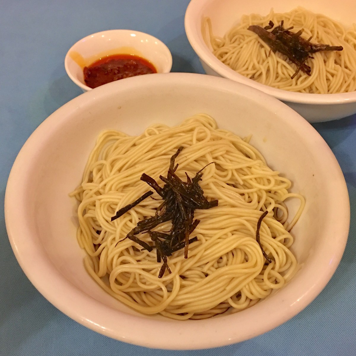 Shanghai scallion oil noodles with glossy soy-scallion sauce and fried scallions.
