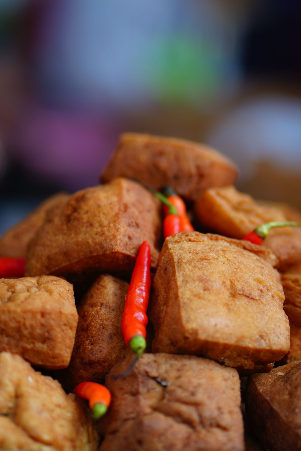 Crispy fried tofu cubes with bright red chiles.