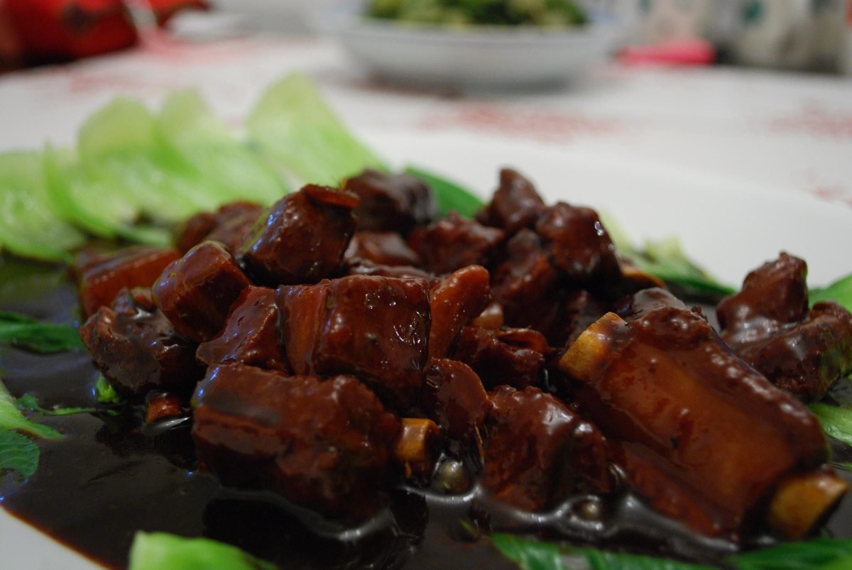 Shanghai sweet and sour pork riblets with a glossy dark vinegar glaze.